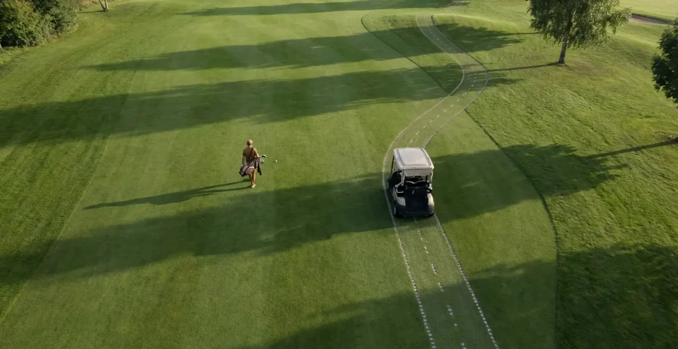 Aerial view of golf cart positioned efficiently on fairway